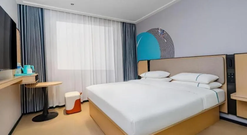 Bed in City Comfort Inn Qianjiang Longxiacheng