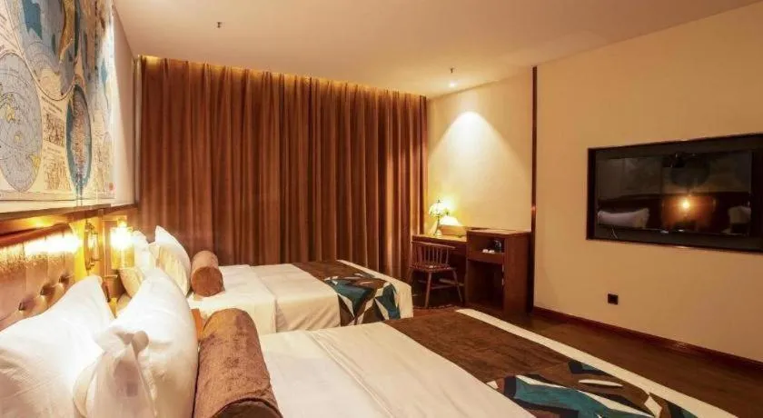 Bed in James Joyce Coffetel· Yinchuan International Exhibition Center Wanda Square Qinshui Street