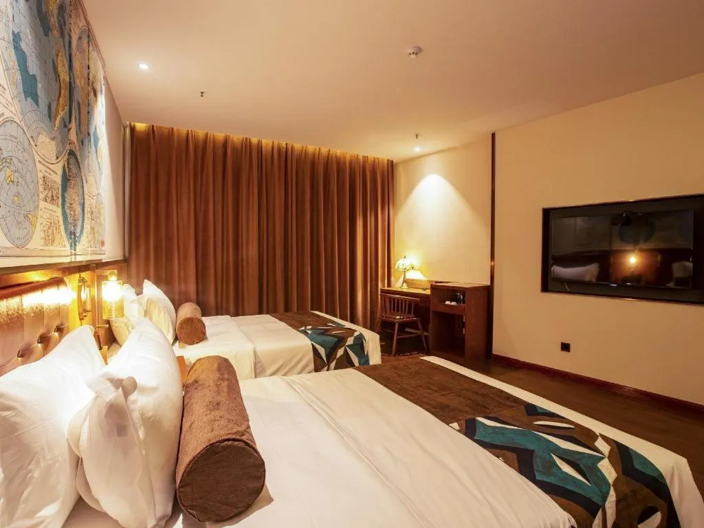 Bed in James Joyce Coffetel· Yinchuan International Exhibition Center Wanda Square Qinshui Street