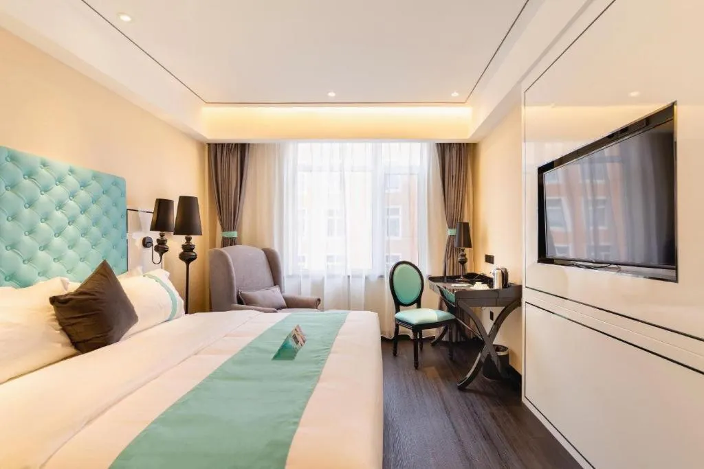 Bed in Xana Hotelle· Dalian Software Park University of Technology