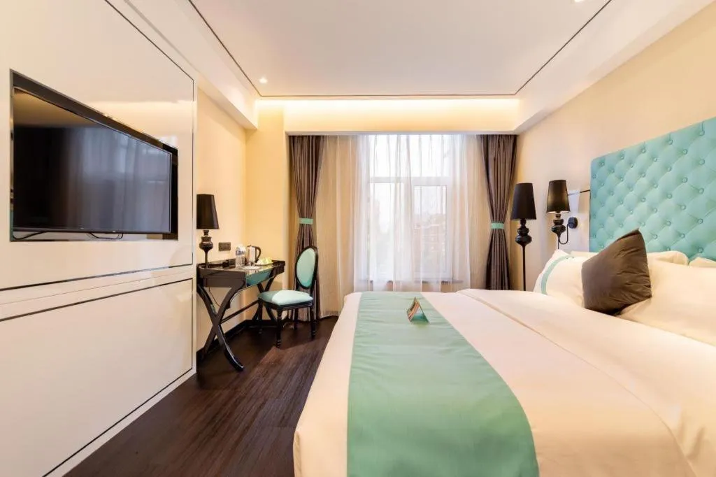 Bed in Xana Hotelle· Dalian Software Park University of Technology