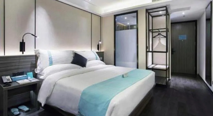 Bed in Xana Hotelle· Dalian Software Park University of Technology