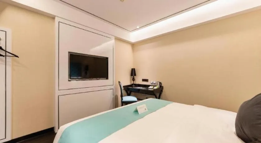 Bed in Xana Hotelle· Dalian Software Park University of Technology