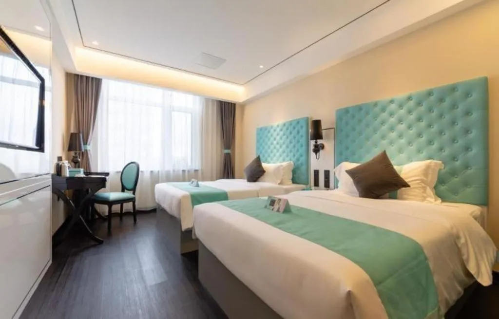 Bed in Xana Hotelle· Dalian Software Park University of Technology