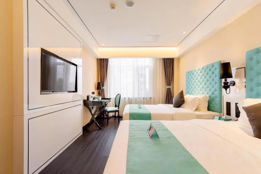 Bed in Xana Hotelle· Dalian Software Park University of Technology