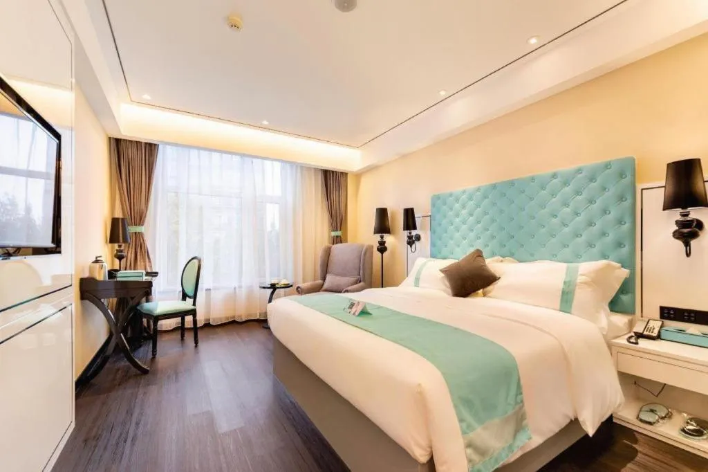 Bed in Xana Hotelle· Dalian Software Park University of Technology