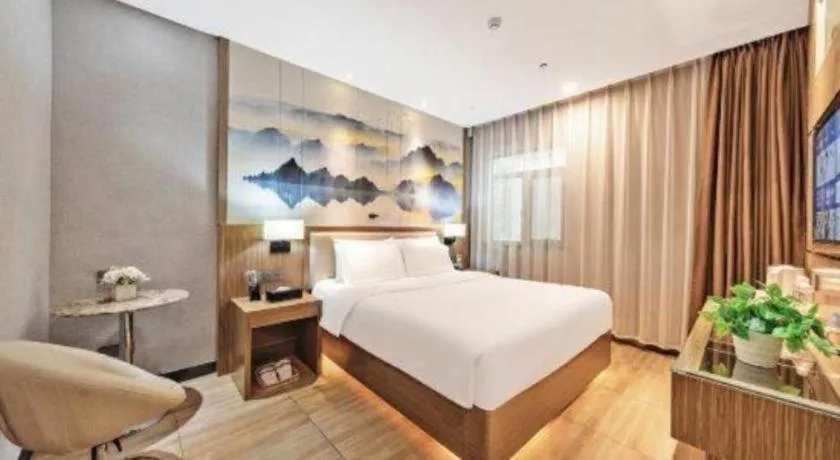 Bed in ZMAX Hotel Beijing Tongzhou Universal Tourist Resort Linheli Metro Station