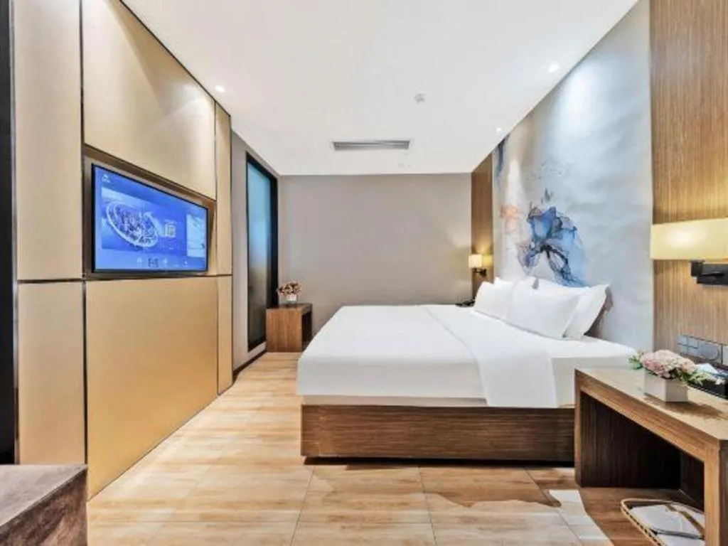 Bed in ZMAX Hotel Beijing Tongzhou Universal Tourist Resort Linheli Metro Station
