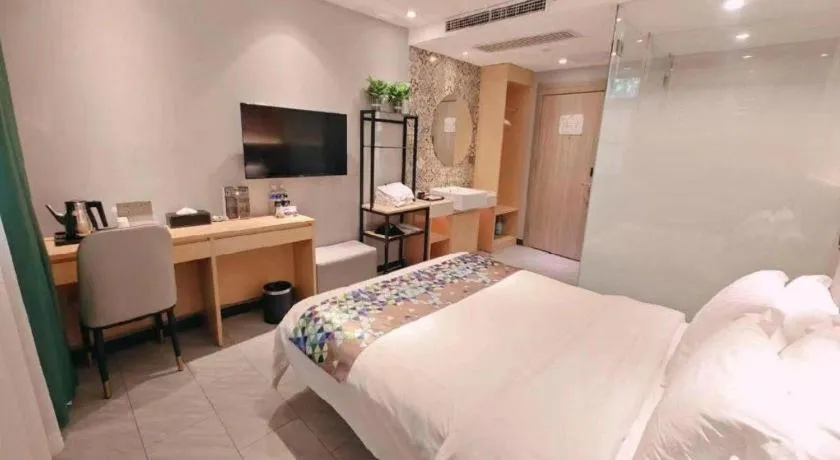 Bed in ZMAX Hotel Beijing Tongzhou Universal Tourist Resort Linheli Metro Station