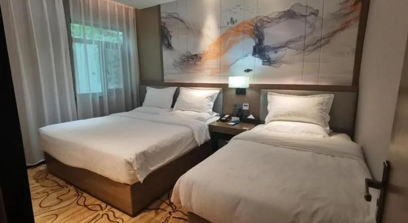 Bed in ZMAX Hotel Beijing Tongzhou Universal Tourist Resort Linheli Metro Station