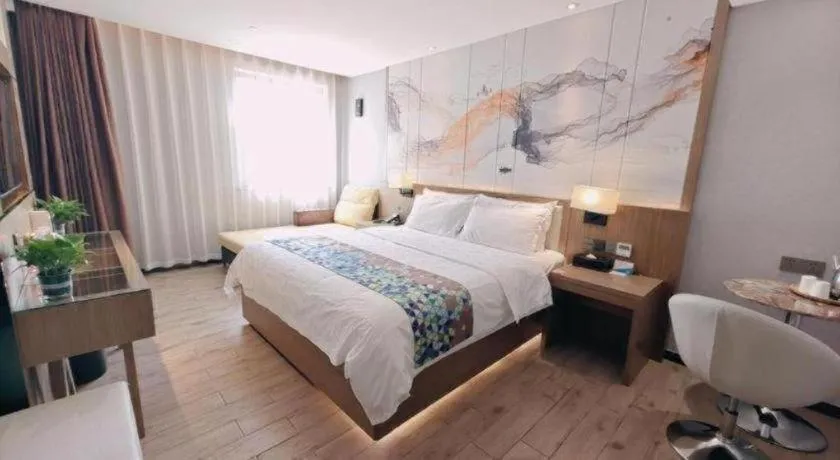 Bed in ZMAX Hotel Beijing Tongzhou Universal Tourist Resort Linheli Metro Station