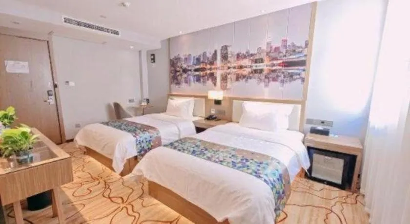 Bed in ZMAX Hotel Beijing Tongzhou Universal Tourist Resort Linheli Metro Station