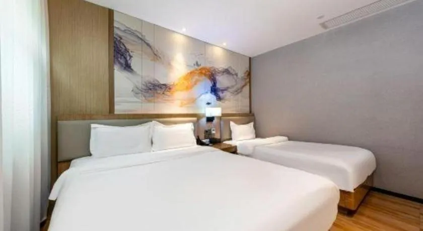 Bed in ZMAX Hotel Beijing Tongzhou Universal Tourist Resort Linheli Metro Station