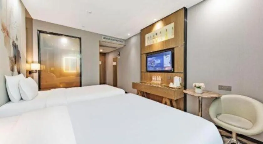 Bed in ZMAX Hotel Beijing Tongzhou Universal Tourist Resort Linheli Metro Station