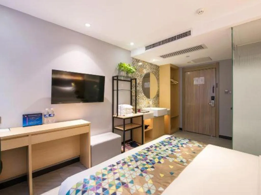 Bed in ZMAX Hotel Beijing Tongzhou Universal Tourist Resort Linheli Metro Station