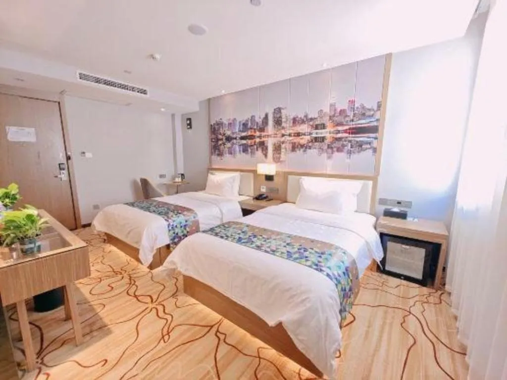 Bed in ZMAX Hotel Beijing Tongzhou Universal Tourist Resort Linheli Metro Station
