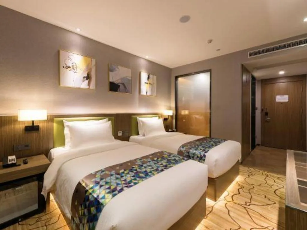 Bed in ZMAX Hotel Beijing Tongzhou Universal Tourist Resort Linheli Metro Station