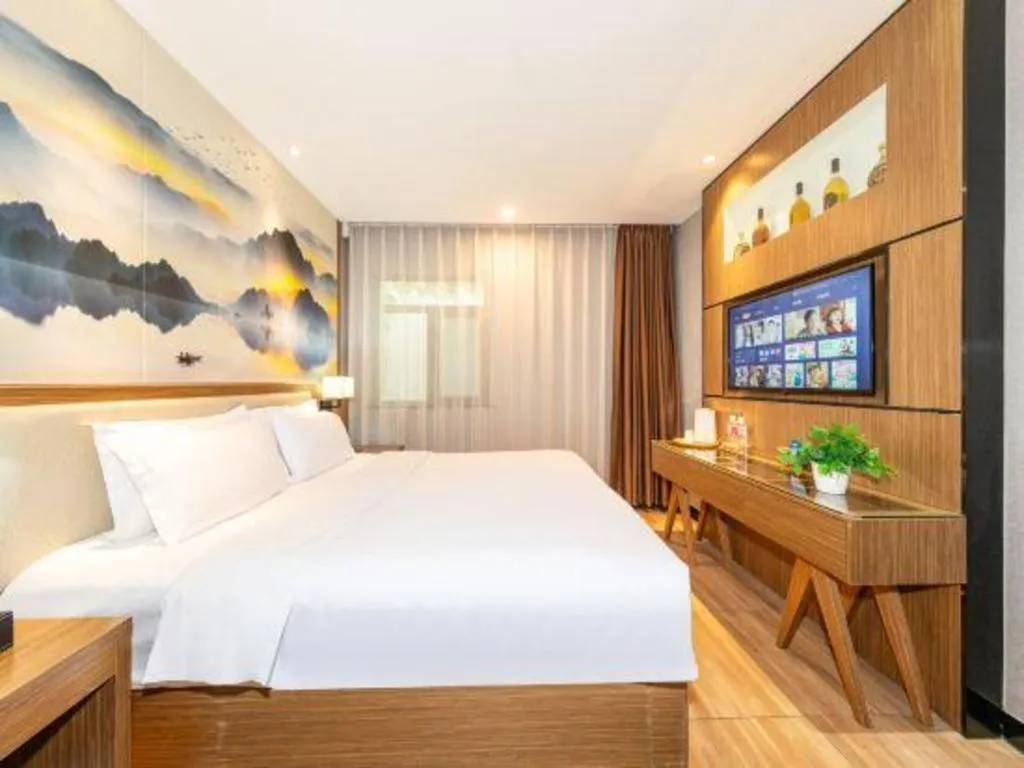 Bed in ZMAX Hotel Beijing Tongzhou Universal Tourist Resort Linheli Metro Station