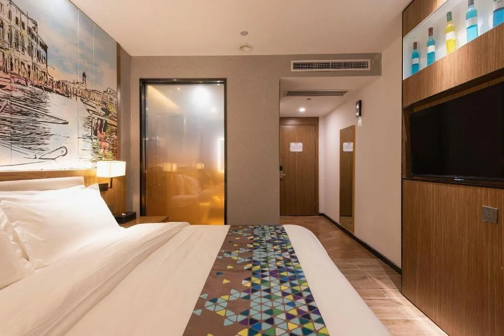 Bed in ZMAX Hotel Beijing Tongzhou Universal Tourist Resort Linheli Metro Station