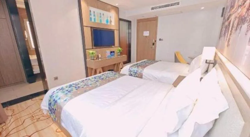 Bed in ZMAX Hotel Beijing Tongzhou Universal Tourist Resort Linheli Metro Station