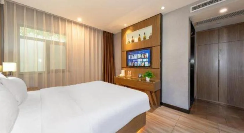 Bed in ZMAX Hotel Beijing Tongzhou Universal Tourist Resort Linheli Metro Station