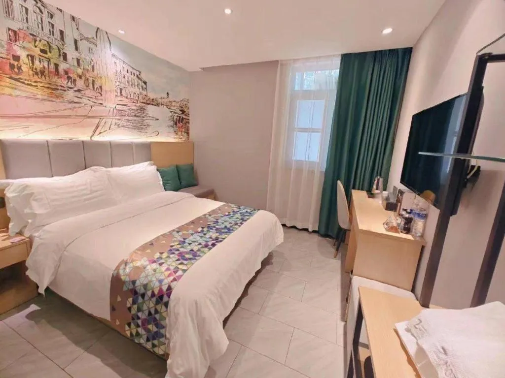 Bed in ZMAX Hotel Beijing Tongzhou Universal Tourist Resort Linheli Metro Station