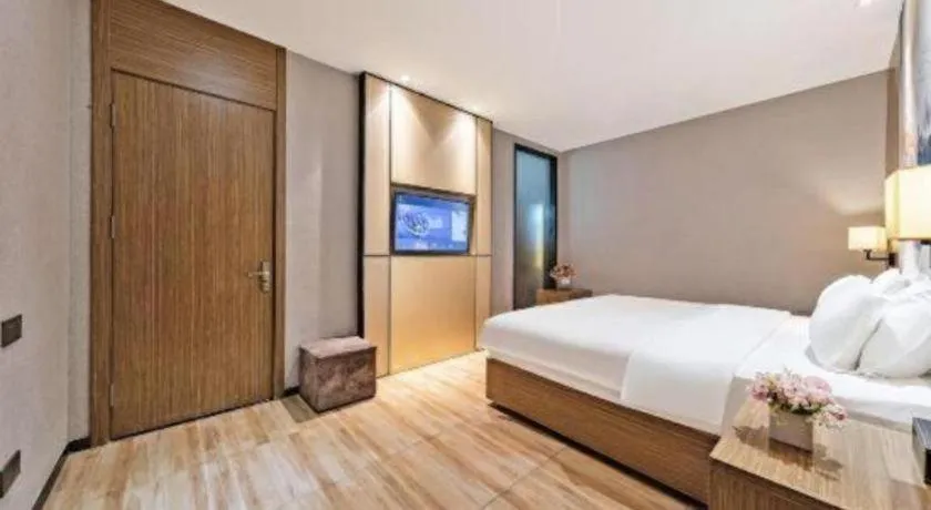 Bed in ZMAX Hotel Beijing Tongzhou Universal Tourist Resort Linheli Metro Station
