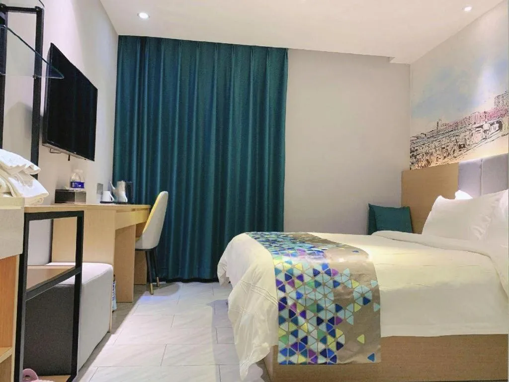 Bed in ZMAX Hotel Beijing Tongzhou Universal Tourist Resort Linheli Metro Station