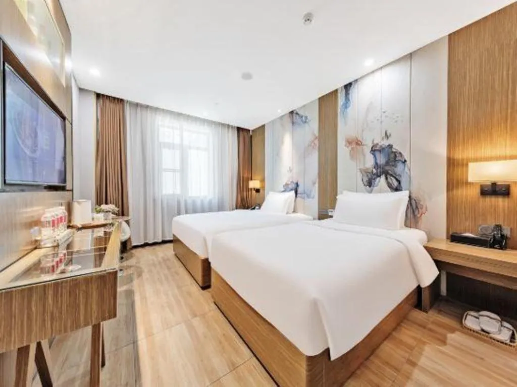 Bed in ZMAX Hotel Beijing Tongzhou Universal Tourist Resort Linheli Metro Station