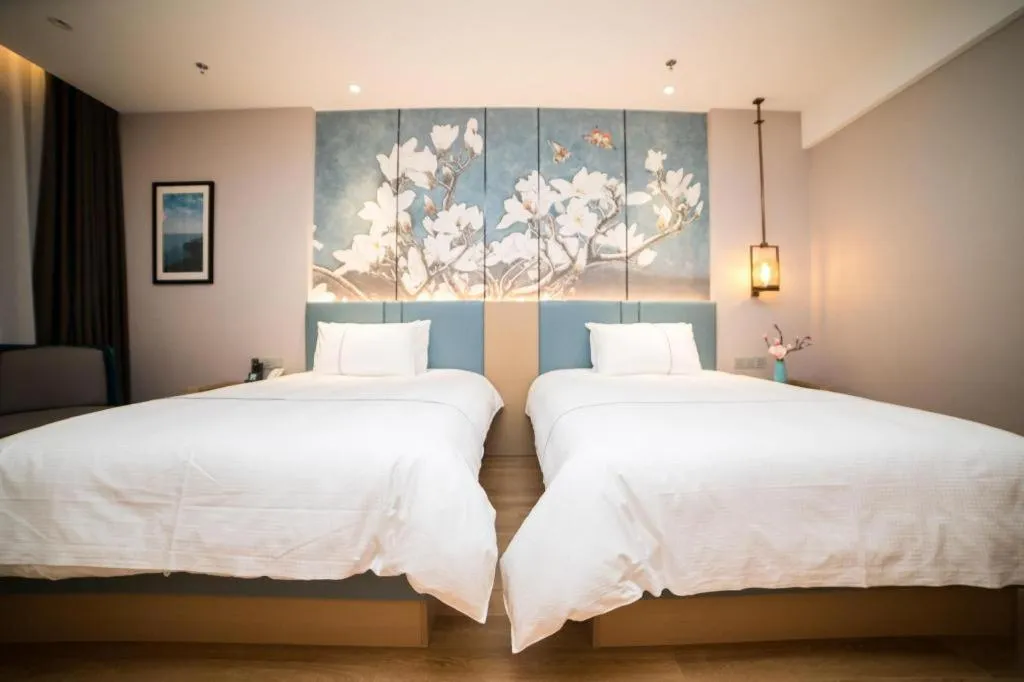 Bed in Magnotel Huludao Xingcheng Central Square Wenquan Street