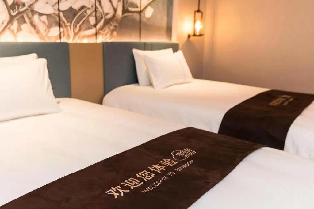 Bed in Magnotel Huludao Xingcheng Central Square Wenquan Street