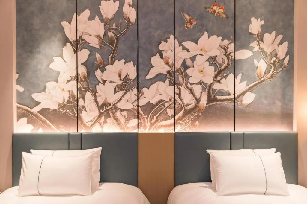 Bed in Magnotel Huludao Xingcheng Central Square Wenquan Street