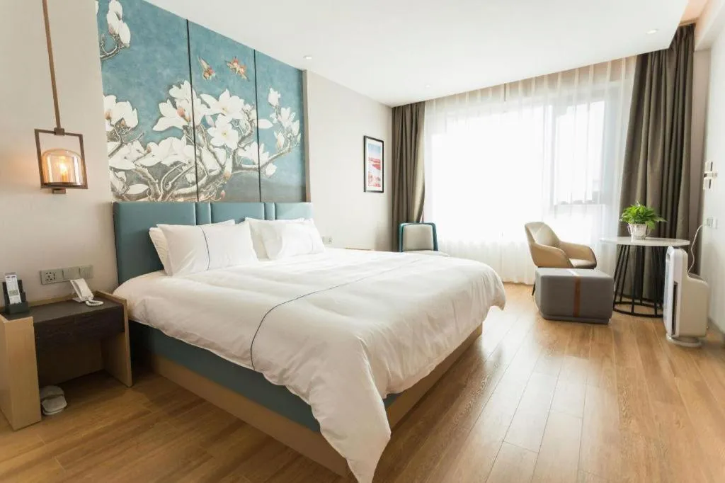Bed in Magnotel Huludao Xingcheng Central Square Wenquan Street
