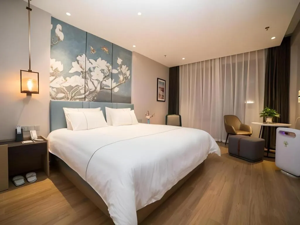 Bed in Magnotel Huludao Xingcheng Central Square Wenquan Street