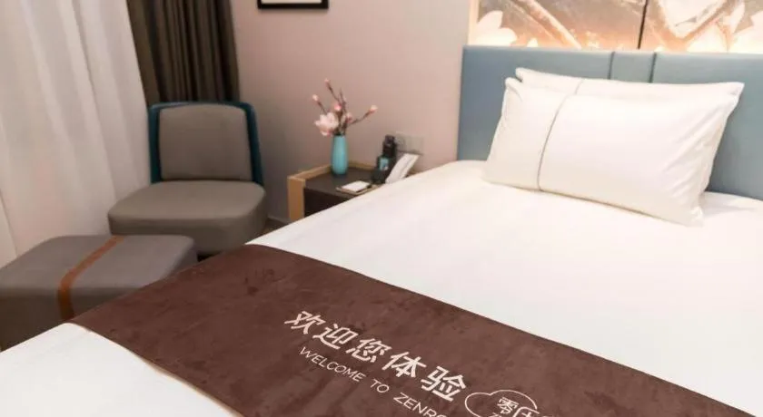 Bed in Magnotel Huludao Xingcheng Central Square Wenquan Street
