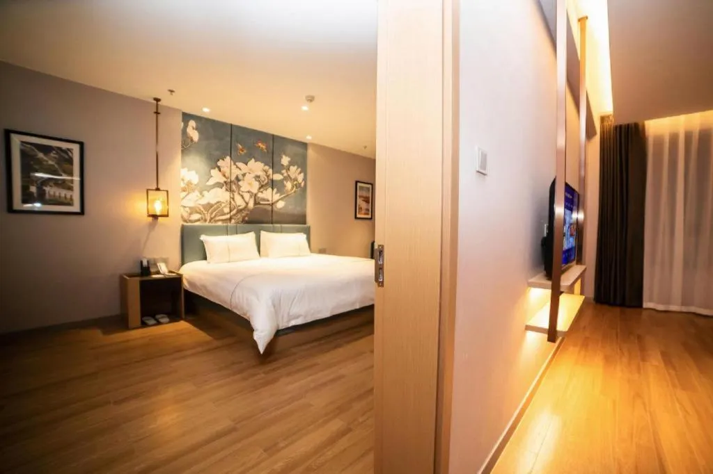 Bed in Magnotel Huludao Xingcheng Central Square Wenquan Street