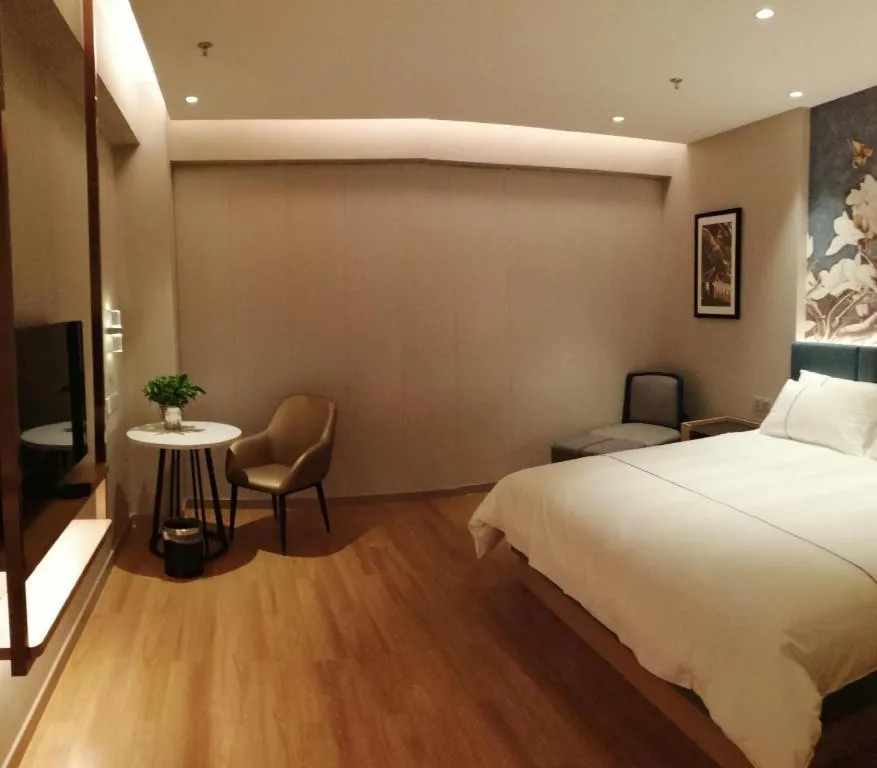 Bed in Magnotel Huludao Xingcheng Central Square Wenquan Street