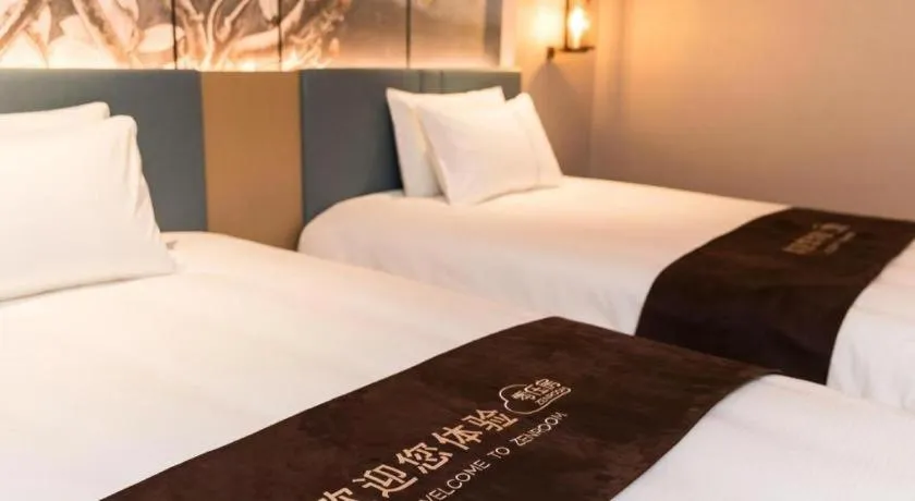 Bed in Magnotel Huludao Xingcheng Central Square Wenquan Street