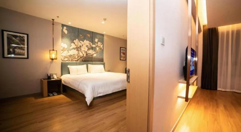 Bed in Magnotel Huludao Xingcheng Central Square Wenquan Street