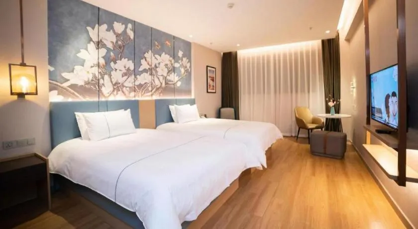 Bed in Magnotel Huludao Xingcheng Central Square Wenquan Street