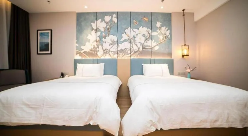 Bed in Magnotel Huludao Xingcheng Central Square Wenquan Street