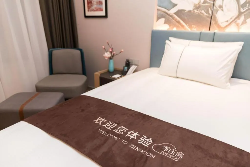 Bed in Magnotel Huludao Xingcheng Central Square Wenquan Street