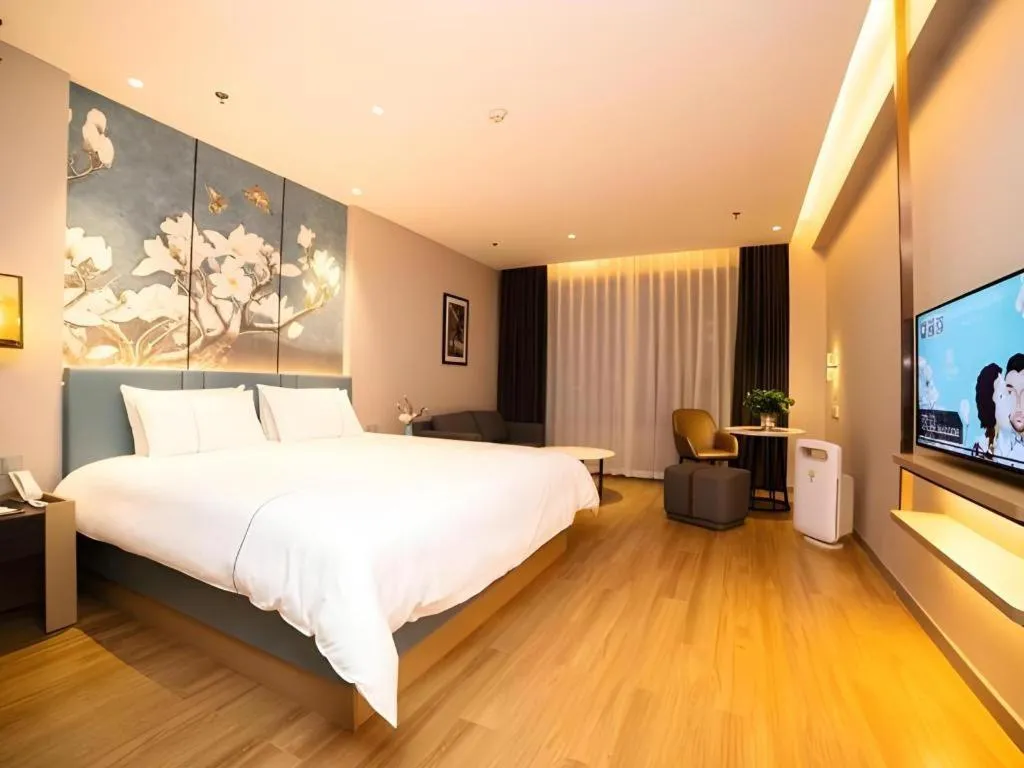Bed in Magnotel Huludao Xingcheng Central Square Wenquan Street