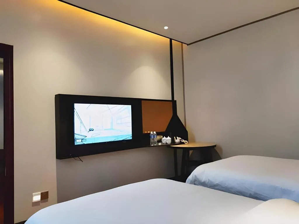 Bed in IU Hotel Xinyu Fenyi Mall