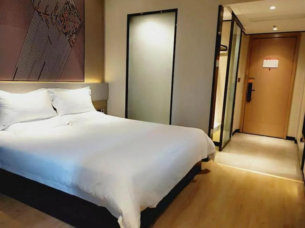 Bed in IU Hotel Xinyu Fenyi Mall