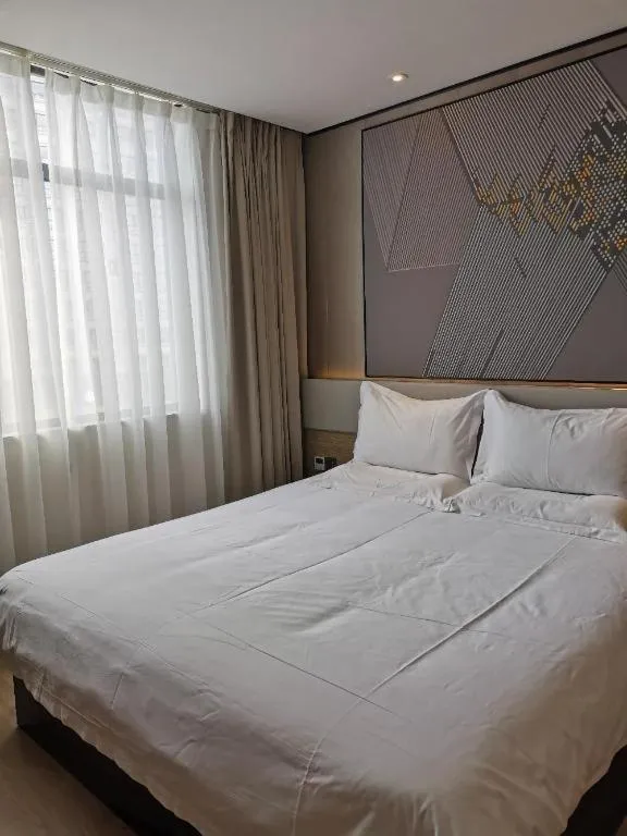 Bed in IU Hotel Xinyu Fenyi Mall