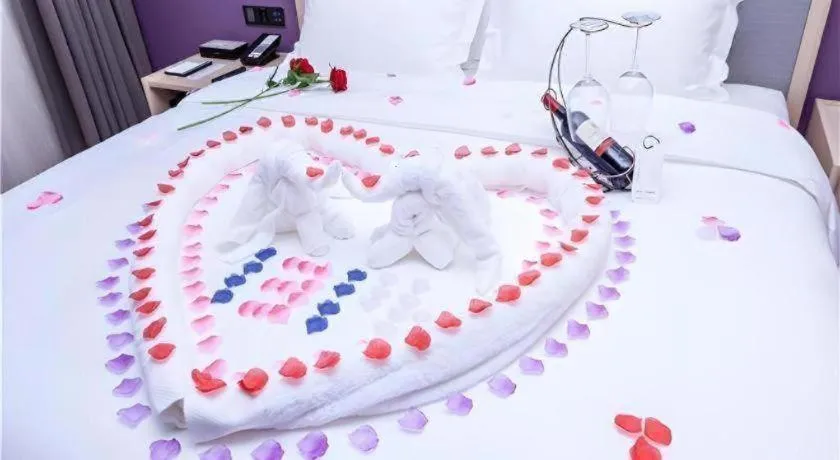 Bed in Lavande Hotel Guangzhou Zengchen Xintang Light Railway Station