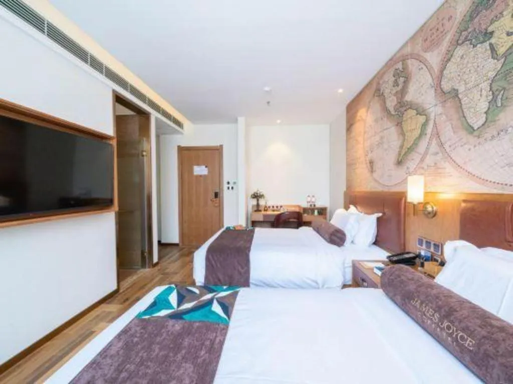 Bed in James Joyce Coffetel Shenyang North Railway Station Qishan Road Metro Station