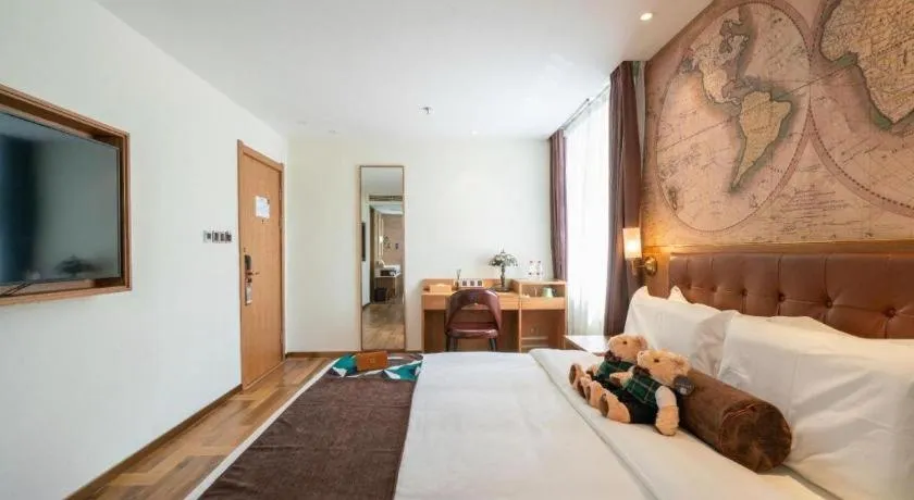 Bed in James Joyce Coffetel Shenyang North Railway Station Qishan Road Metro Station