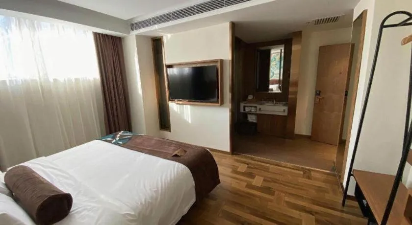 Bed in James Joyce Coffetel Shenyang North Railway Station Qishan Road Metro Station